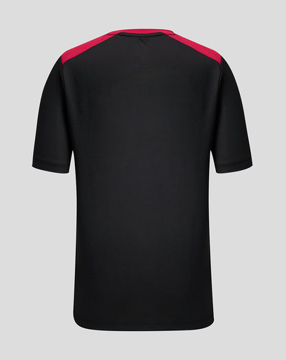 Black t-shirt with red shoulders on a gray background