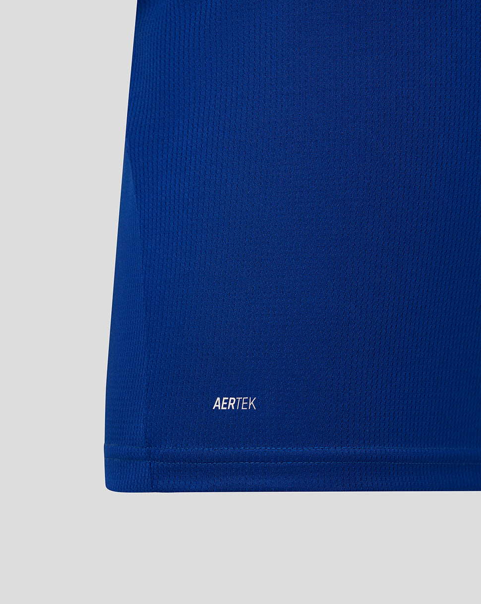 Close-up of a blue fabric with 'AERTEK' branding on a light gray background