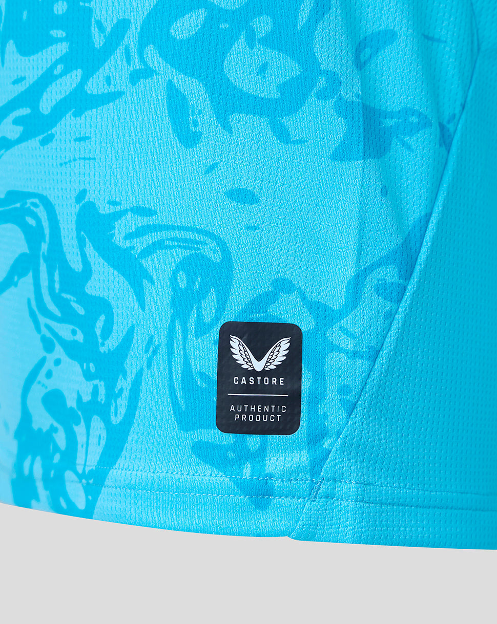 Blue athletic shirt with a 'Castore' logo and branding