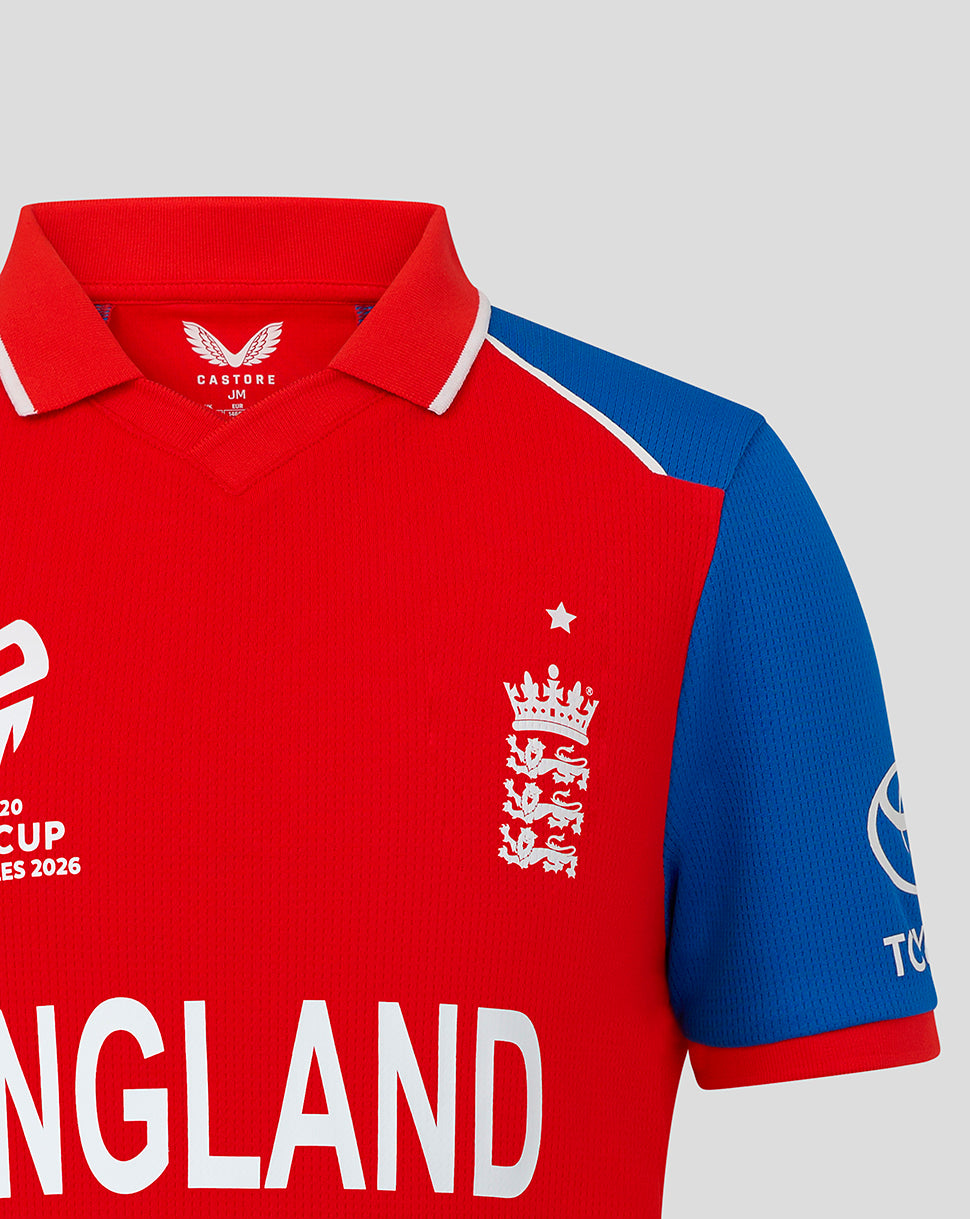 Front view of red England junior T20 World Cup shirt with England crest on chest and blue sleeves
