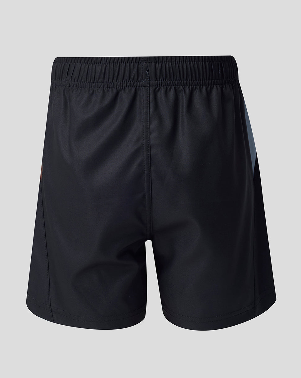 Back view of junior black home replica shorts with elastic waistband