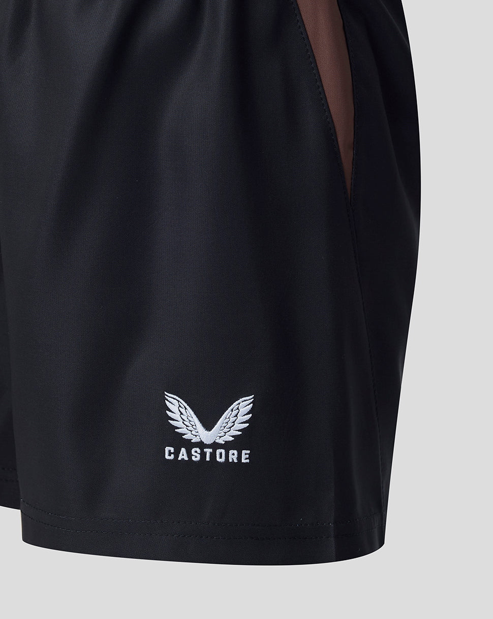 Castore logo patch on the shorts leg of Harlequins junior home shorts