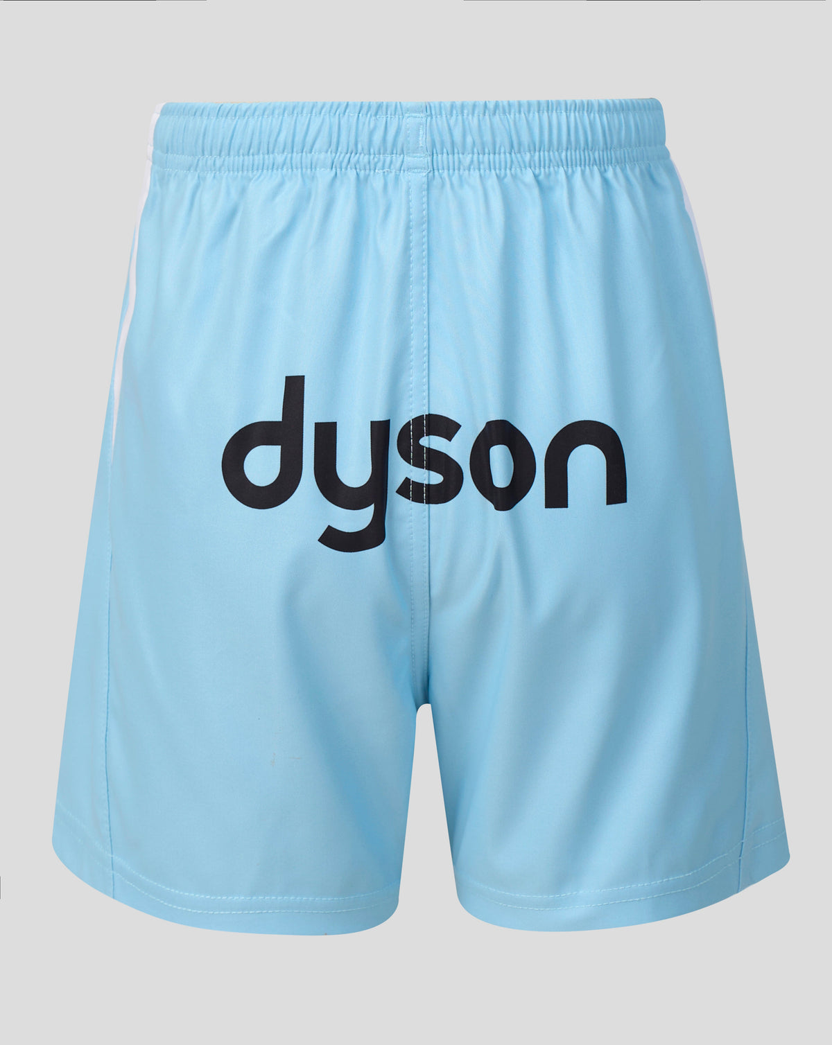 Light blue athletic shorts with a black 'dyson' logo printed across the front, shown against a neutral gray background.