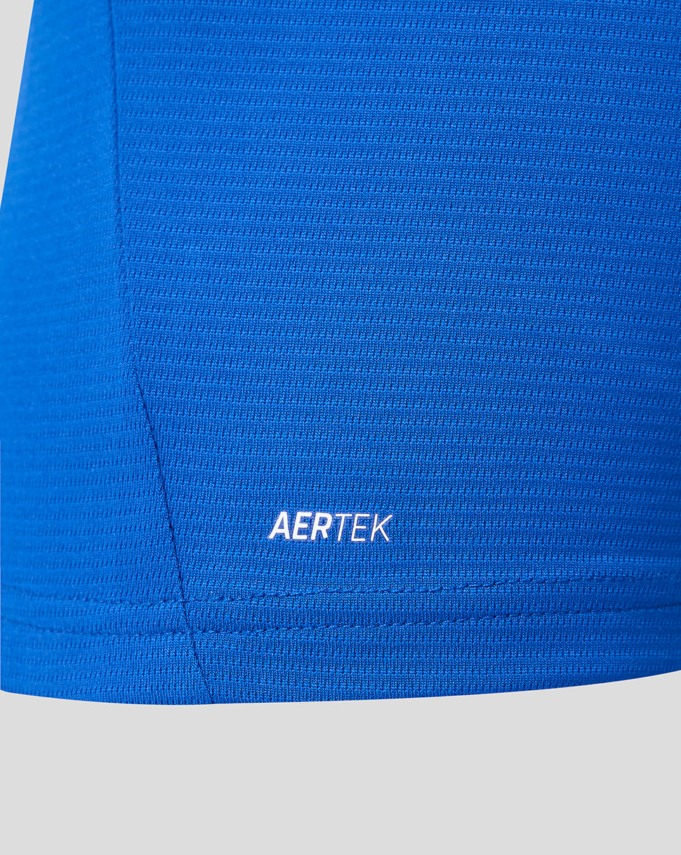 Blue jersey fabric with AERTEK badge at the lower hem.