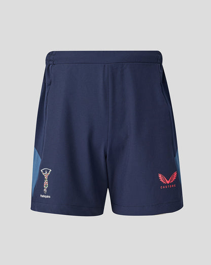 Navy shorts with logos on a light gray background