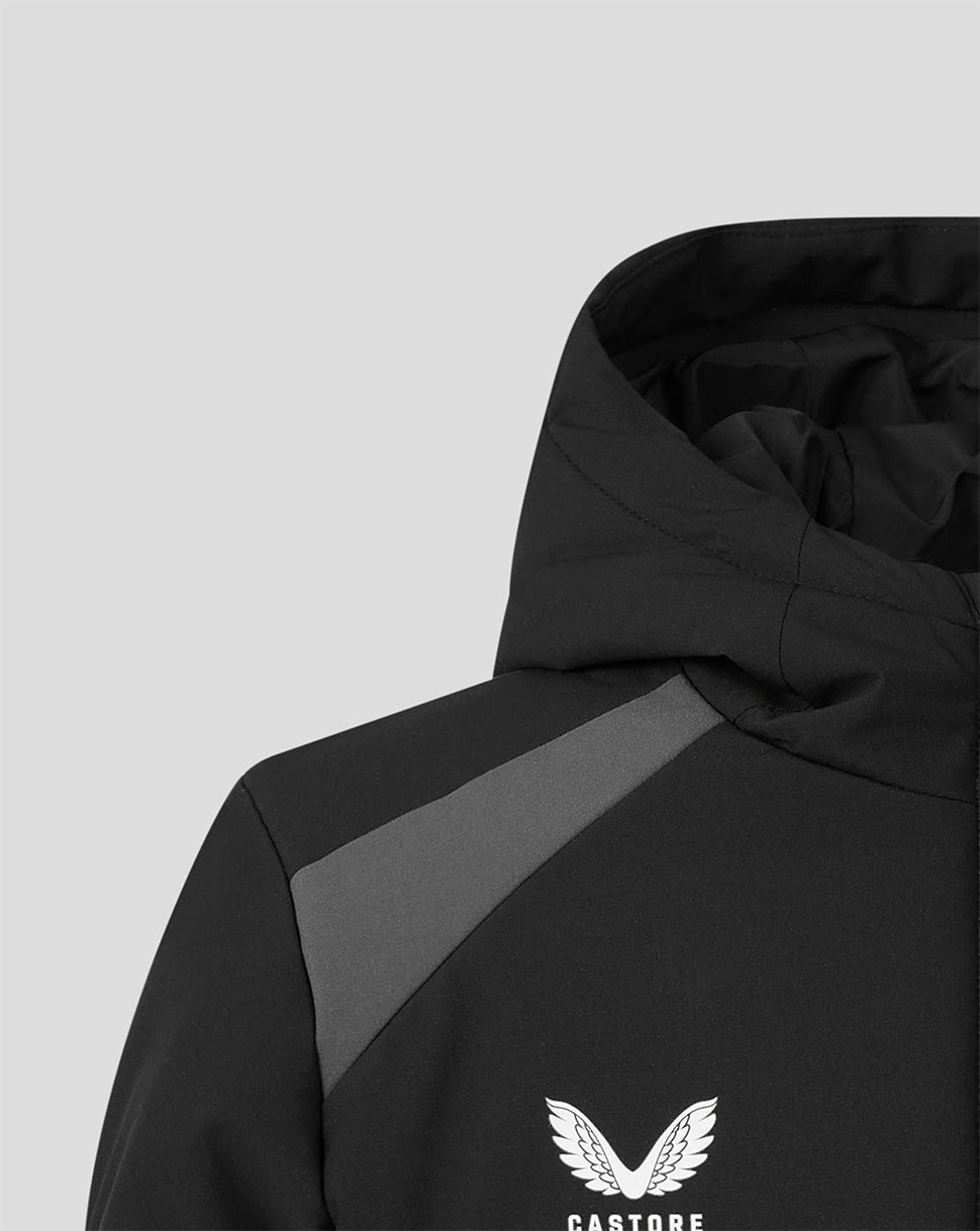 Close-up of a black hooded jacket with a gray diagonal shoulder panel and a white Castore wing logo on the chest, shown against a light gray background.