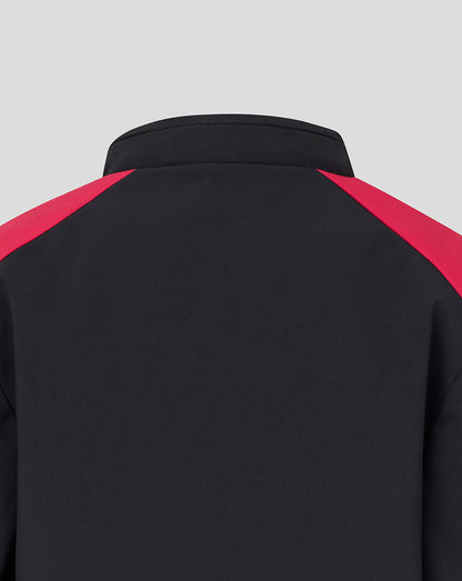 Black jacket with red shoulders on a light gray background
