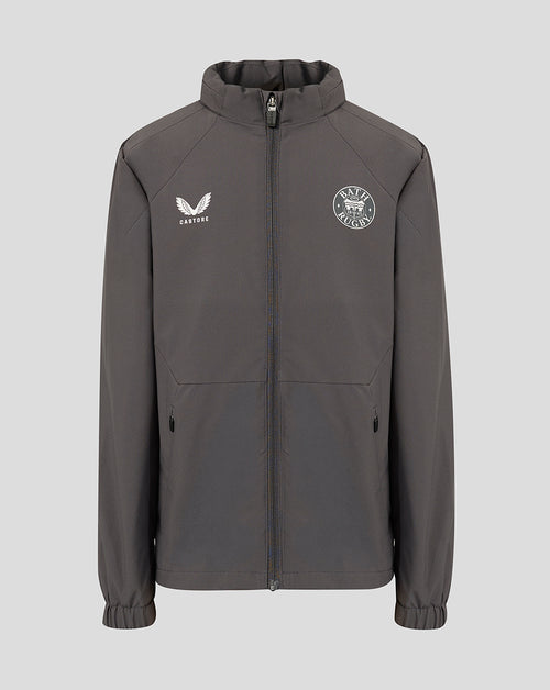 A dark gray full-zip jacket with a stand-up collar, featuring a white wing logo with 'CASTORE' underneath on the right chest and a circular 'BATH RUGBY' logo on the left chest, displayed against a solid light gray background.