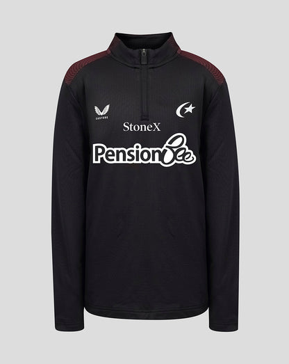 A black long-sleeve quarter-zip pullover with white printed sponsor logos (StoneX, Pension Bee) and team crests on the chest, and dark red shoulder panels, shown against a solid gray background.