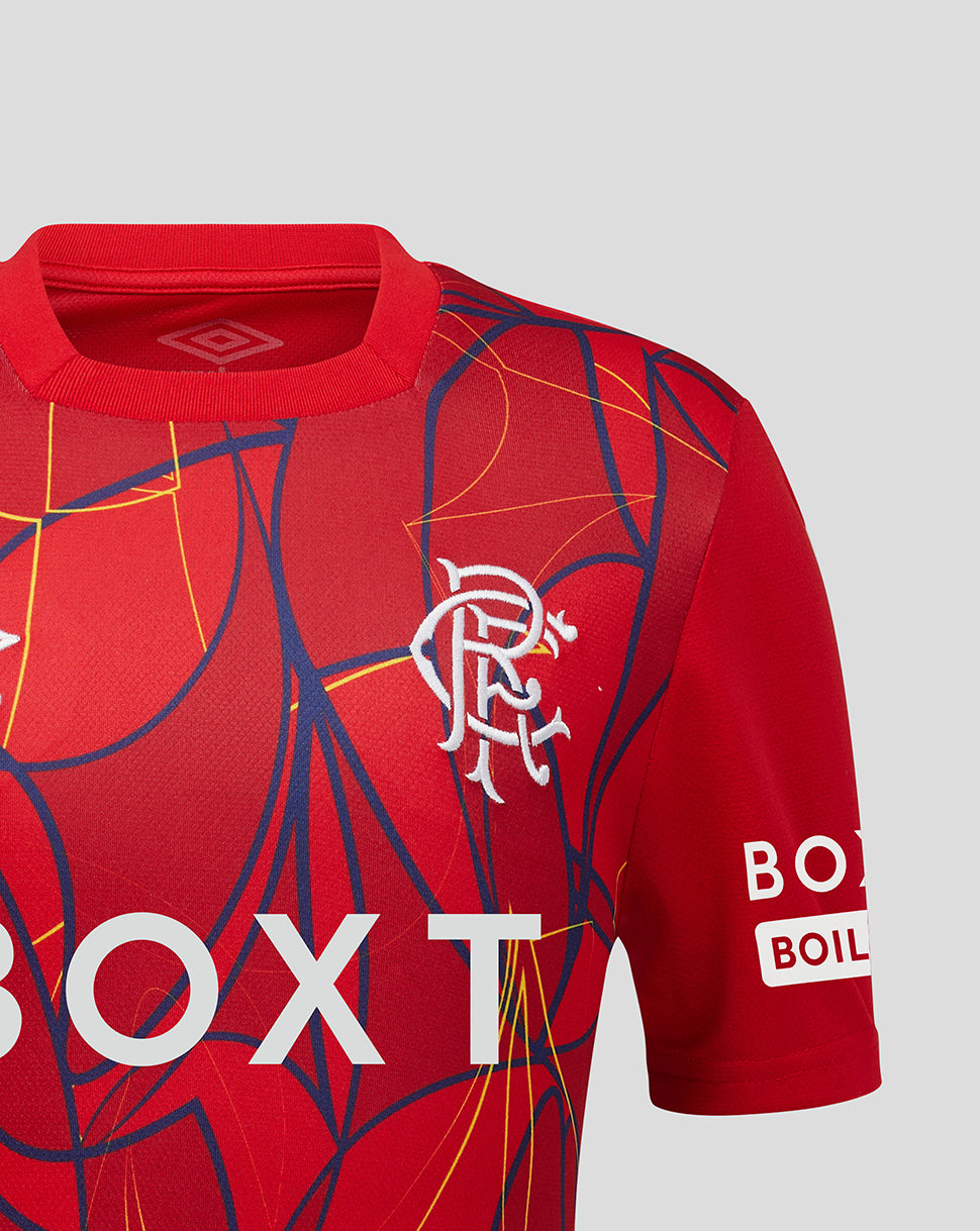 Shoulder-close view of the Rangers junior away goalkeeper shirt with the club crest and dynamic abstract design.