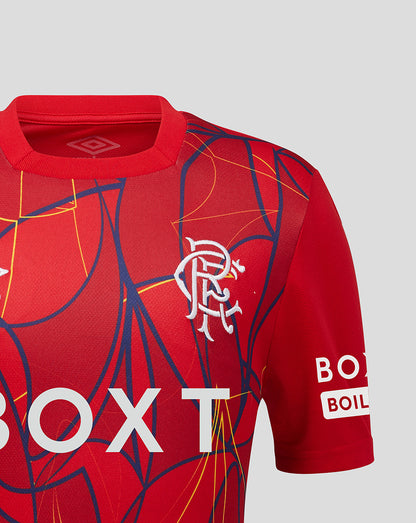 Shoulder-close view of the Rangers junior away goalkeeper shirt with the club crest and dynamic abstract design.