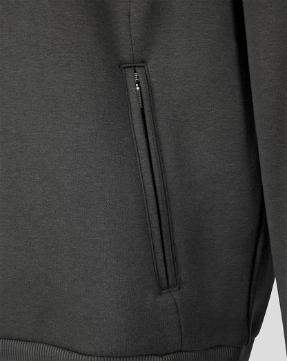 Close-up of a dark gray ribbed knit garment, likely a sweatshirt, showing a vertical zippered pocket on the side.