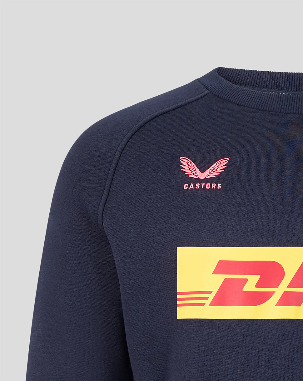 Close up of navy sweatshirt chest area showing pink Castore crest and large DHL logo