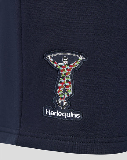Harlequins logo patch on navy fabric of men's travel shorts