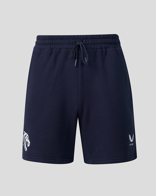 Front view of navy Leicester Tigers travel shorts with a drawstring waistband and white logo at the hem.