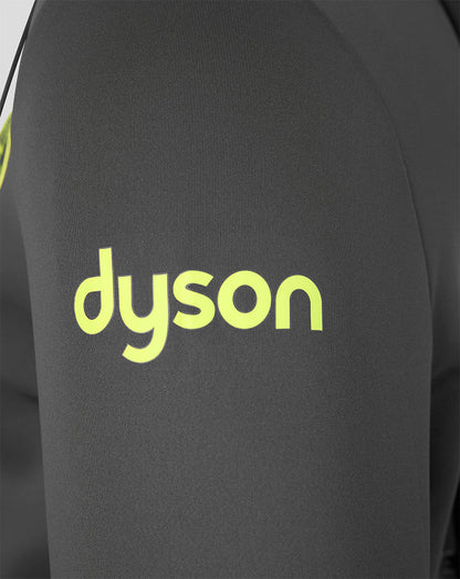 Close-up of a dark gray or black athletic top with a bright yellow-green Dyson logo printed on the chest.