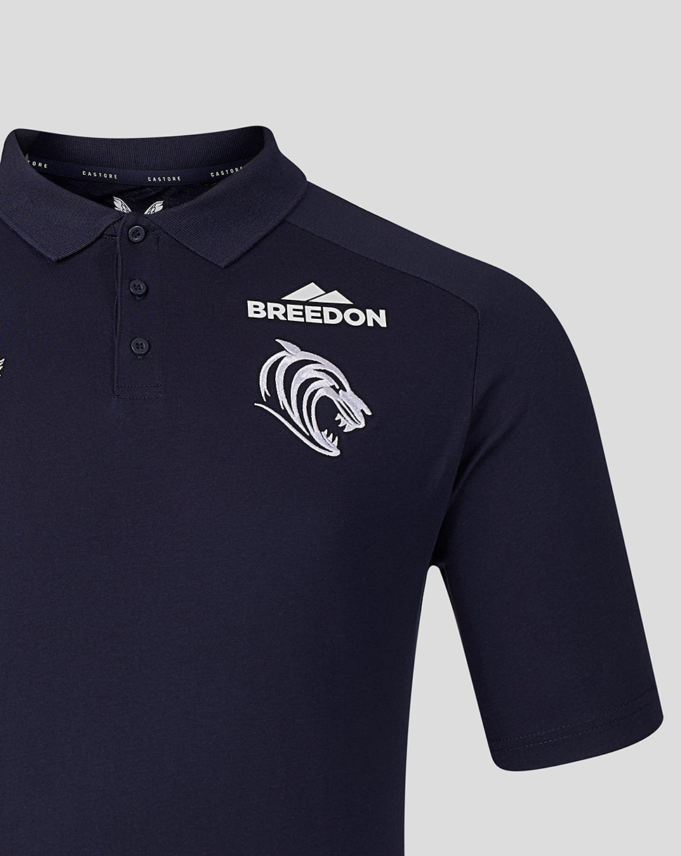 Front view of navy Leicester Tigers Travel Polo featuring the Breedon logo and tiger head crest on the chest