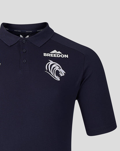 Front view of navy Leicester Tigers Travel Polo featuring the Breedon logo and tiger head crest on the chest
