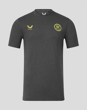 A dark gray short-sleeve t-shirt with a yellow and white logo on the left chest and a yellow circular logo on the right chest, displayed against a solid gray background.