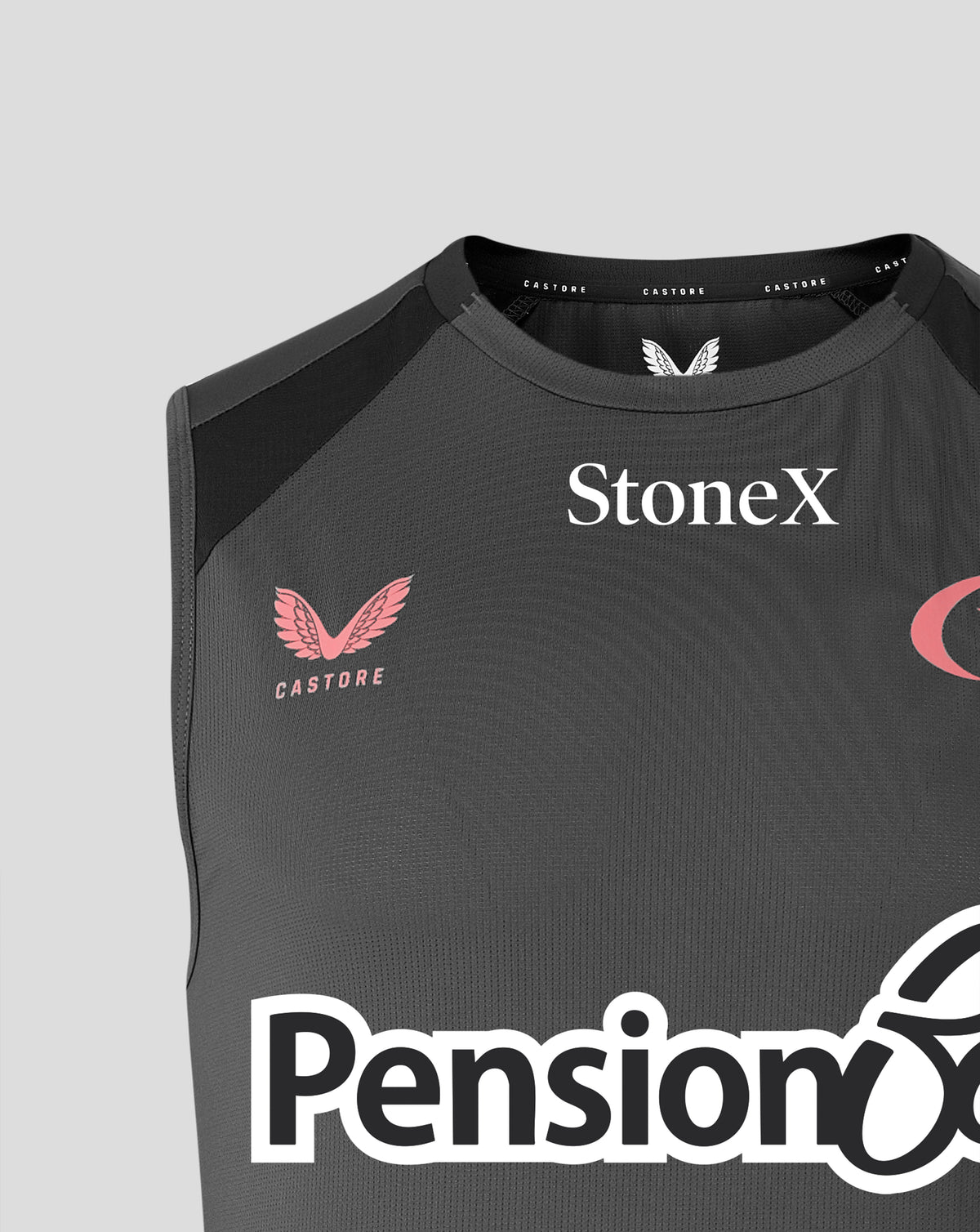 Close-up of a dark gray sleeveless athletic top with black shoulder panels, featuring the StoneX logo in white on the chest, a pink Castore wing logo, and part of the Pension6 logo at the bottom.