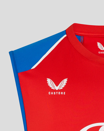 Red and blue sports outfit with Castore logo on a gray background