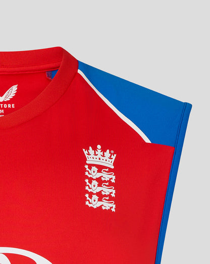 Red sports jersey with blue sleeves and a white emblem on a gray background