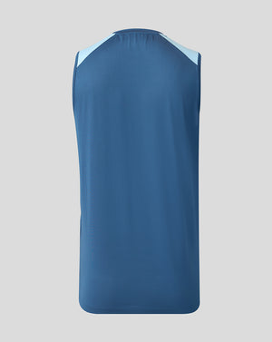 Blue sleeveless shirt on a gray background