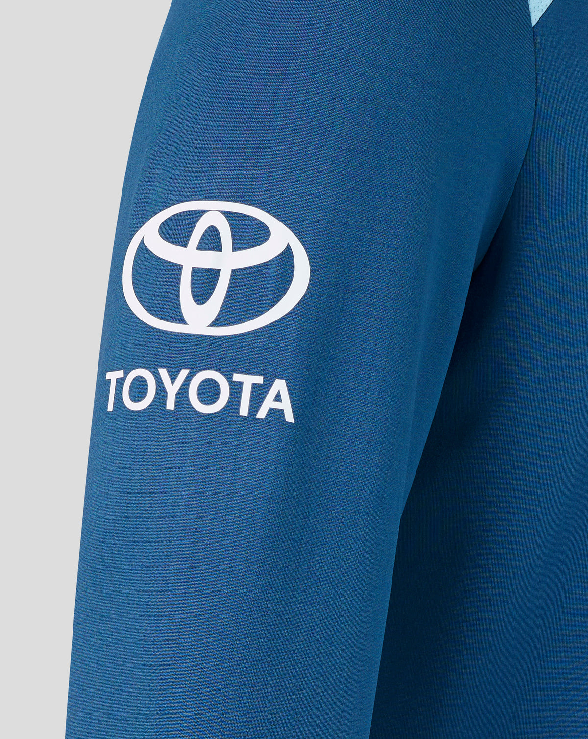 Blue sleeve with Toyota logo on a gray background