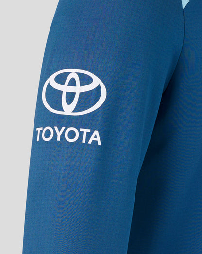 Blue sleeve with Toyota logo on a gray background
