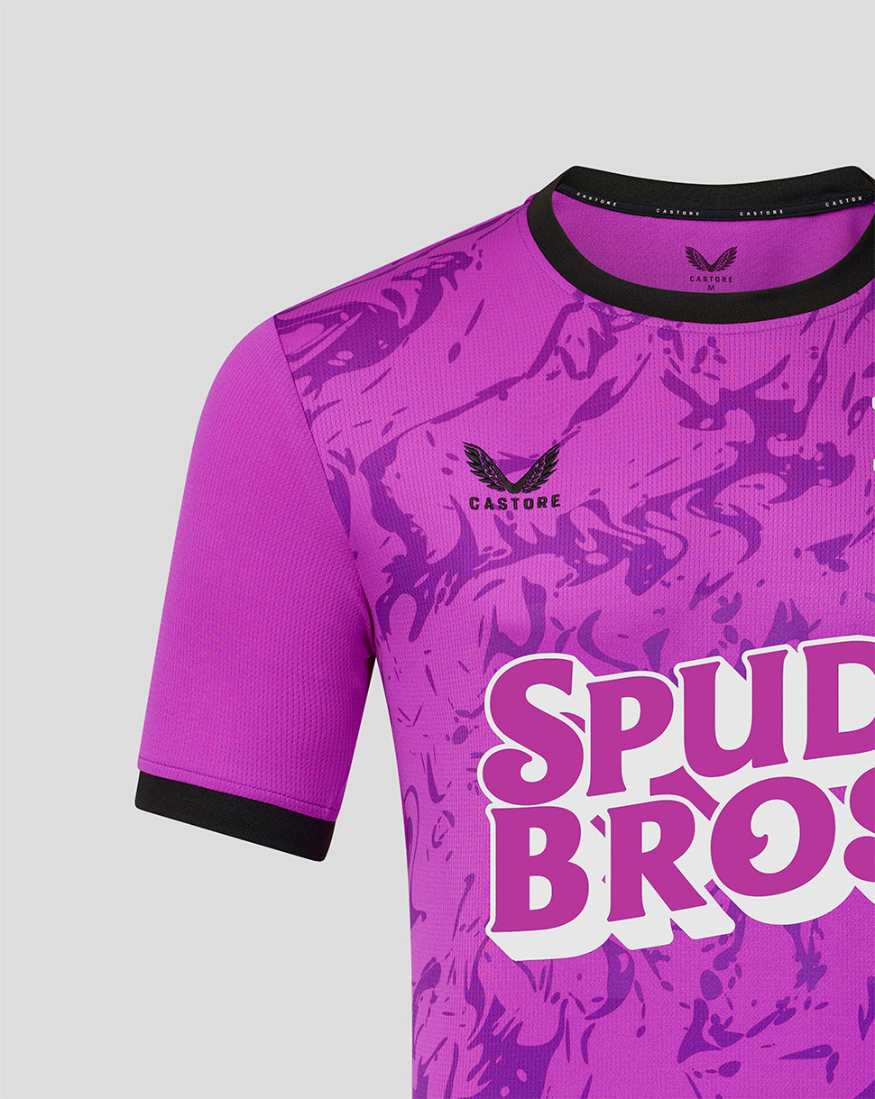 Close up of purple camouflage goalkeeper shirt showing the Preston North End crest on the chest and Castore branding.
