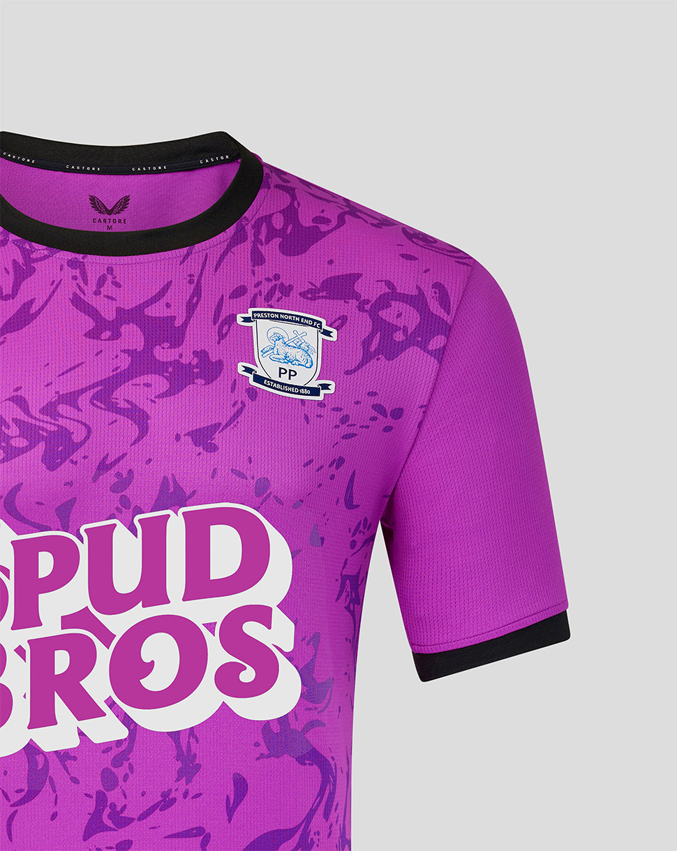 Detail of the purple camouflage goalkeeper shirt sleeve with black cuff and the bold Spud Bros logo on the front.