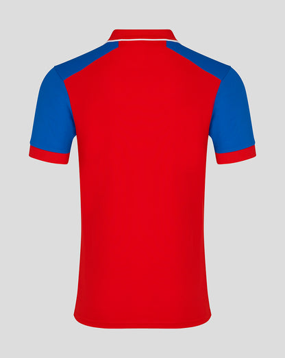 Back view of England Cricket short sleeve shirt in bold red with blue shoulder panels and white collar trim