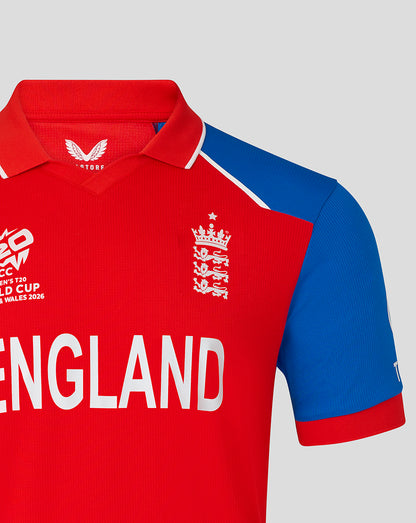 England cricket replica shirt in red with bold ENGLAND lettering and crest on the chest against a blue sleeve.