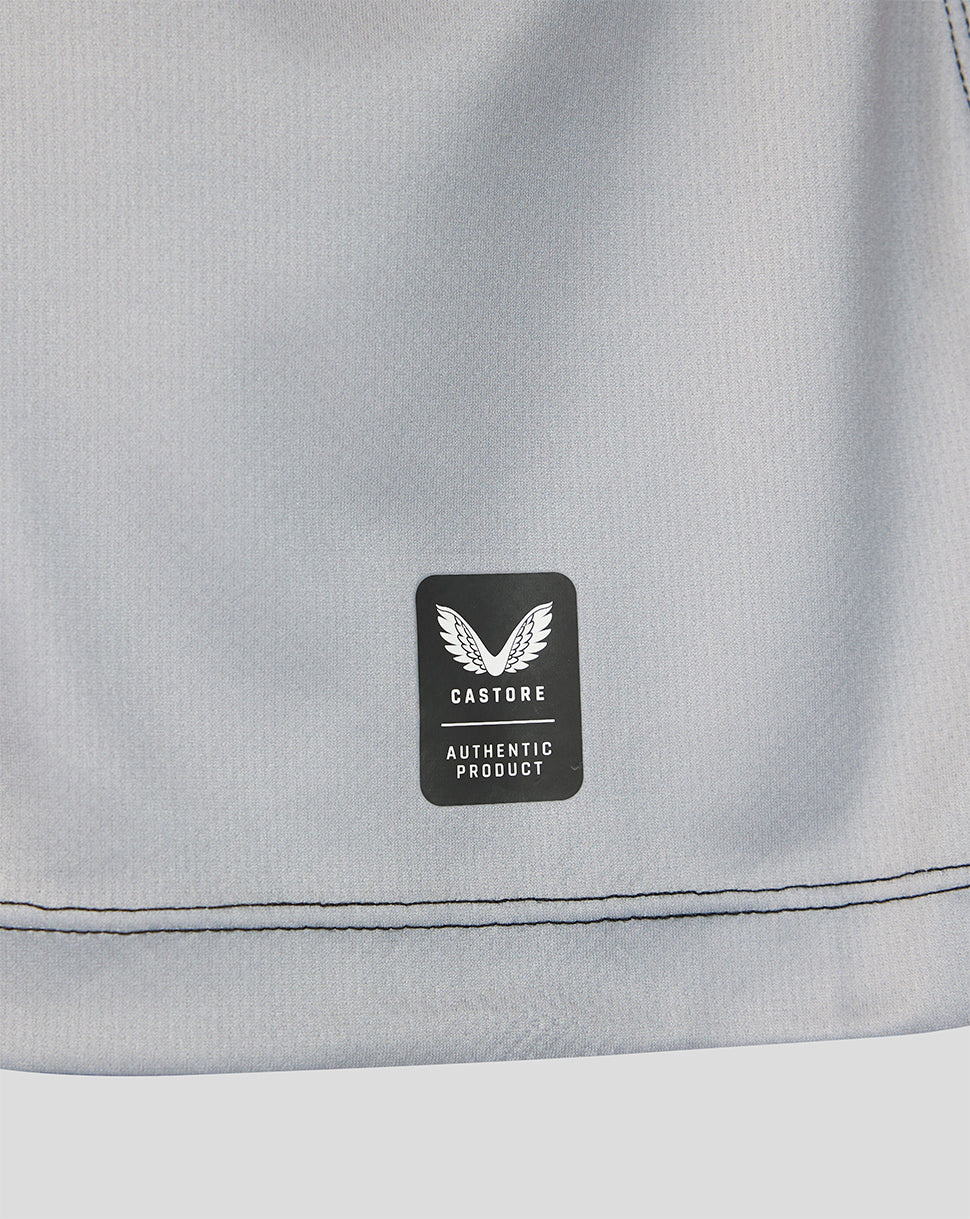 Close-up of light grey Castore authentic product patch on Harlequins 2026/27 home shirt fabric
