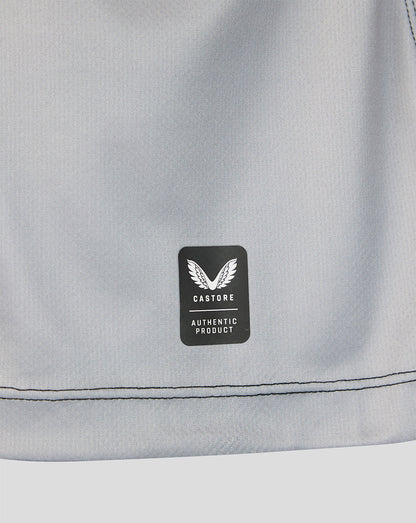 Close-up of light grey Castore authentic product patch on Harlequins 2026/27 home shirt fabric