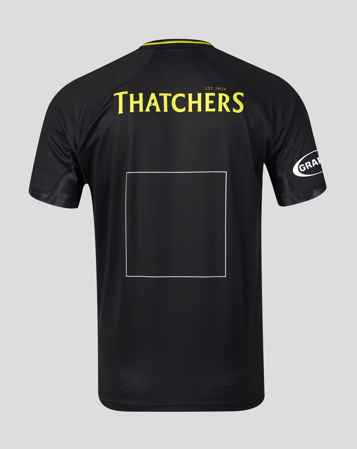 Black short-sleeve sports jersey shown from the back on a light gray background, featuring 'THATCHERS' in yellow text across the upper back, a large blank rectangular patch area in the center, and a white circular 'GRA' logo on the sleeve.