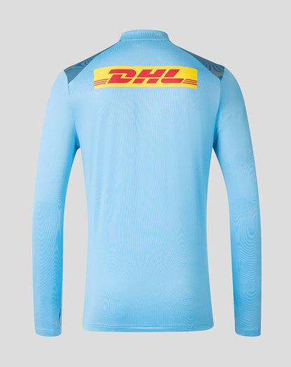 Light blue long-sleeve shirt with DHL logo on a gray background