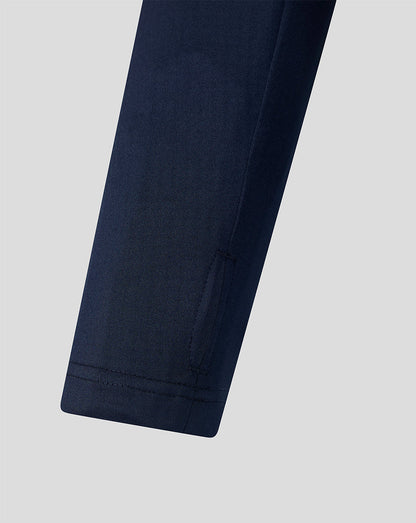 Navy blue jacket on a light gray background