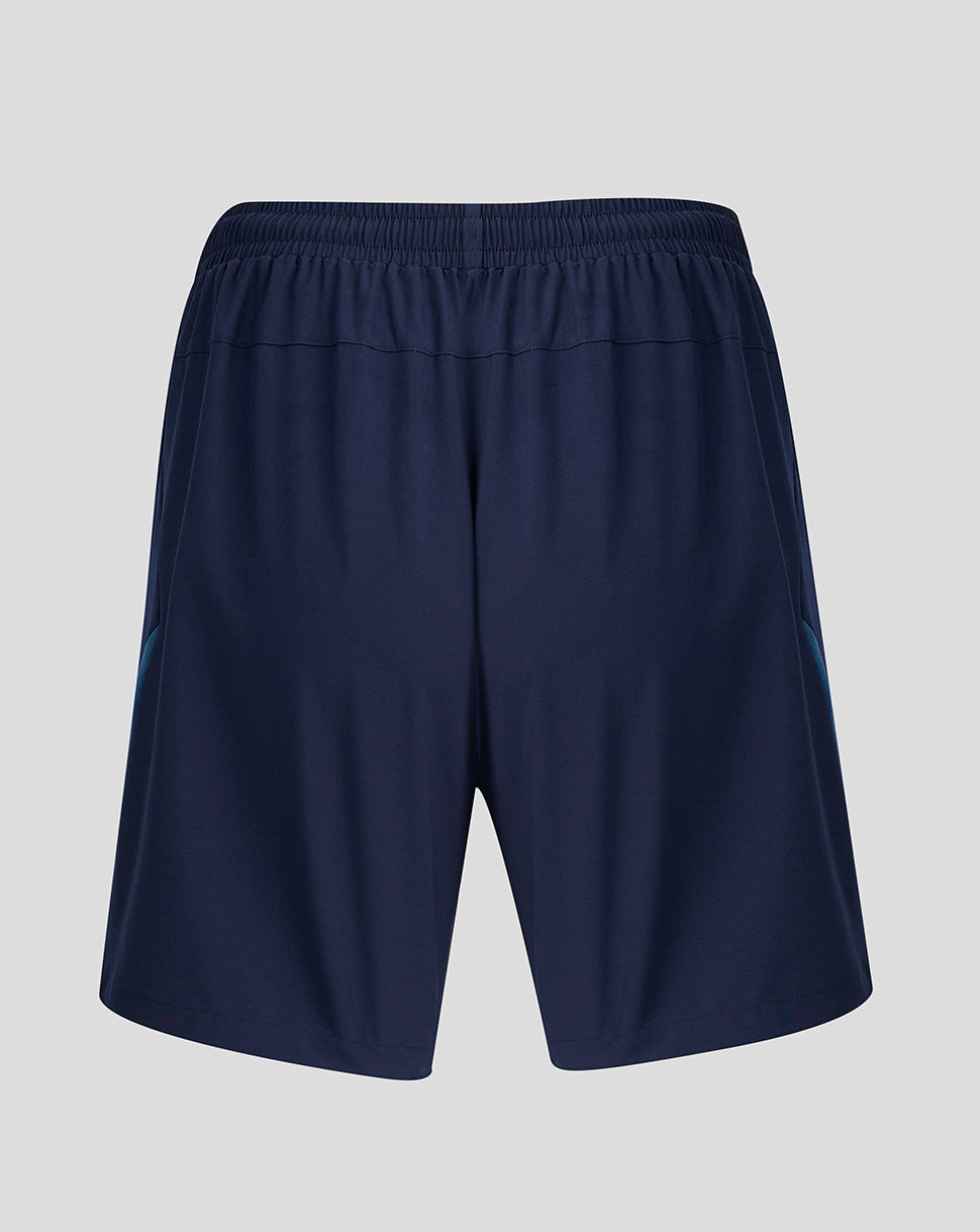 Back view of navy training shorts with teal side panels and gold tiger crest on left leg and Castore emblem on right leg.
