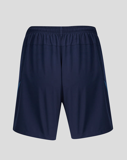 Back view of navy training shorts with teal side panels and gold tiger crest on left leg and Castore emblem on right leg.