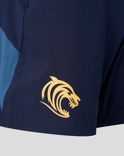 Leicester Tigers navy training shorts with teal side panel and gold tiger crest on the leg