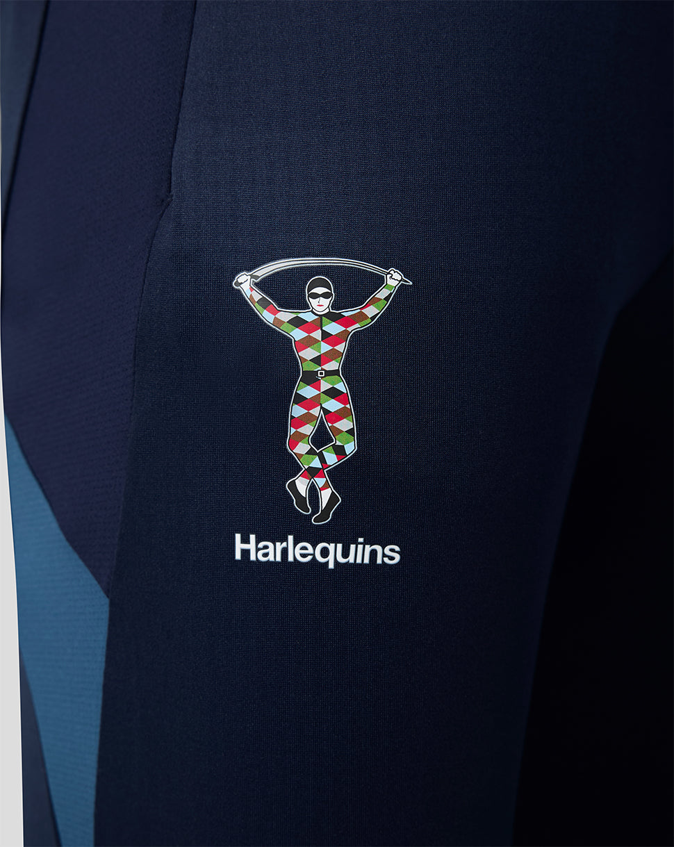 Navy blue sports kit with Harlequins logo on a dark background