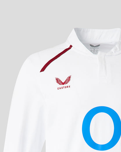 Close up of white England Rugby Women's home long sleeve shirt with red shoulder stripe rose crest and large blue sponsor circle.