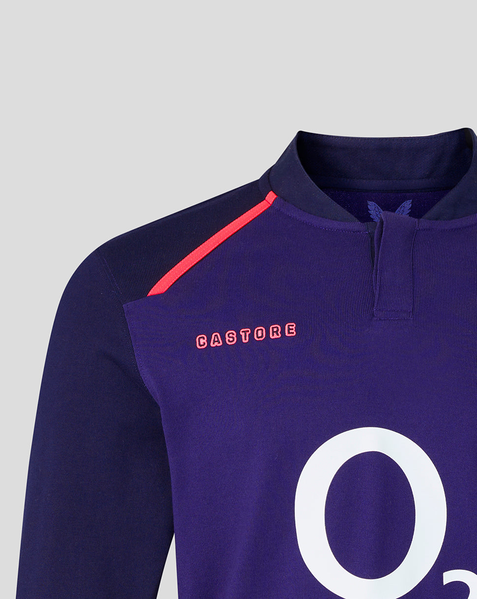 Chest close-up of the Rhodonite jersey showing pink CASTORE embroidery and a large white logo partially visible.