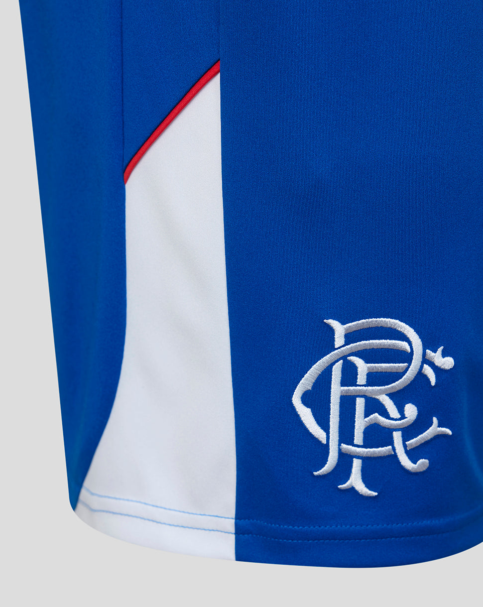 Blue and white sports shorts with a logo on a light gray background