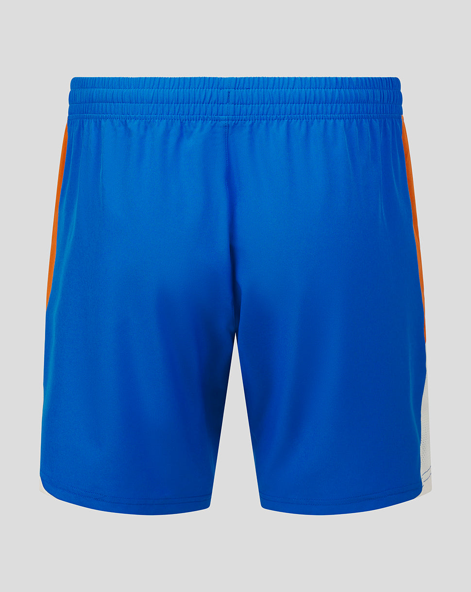 Blue shorts with orange side stripes on a gray background
