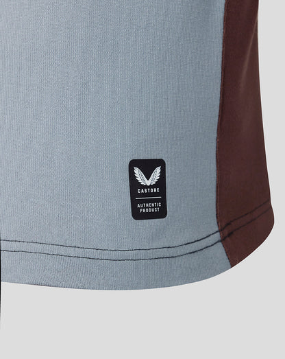 Close-up of a product with a visible brand label on a light gray background