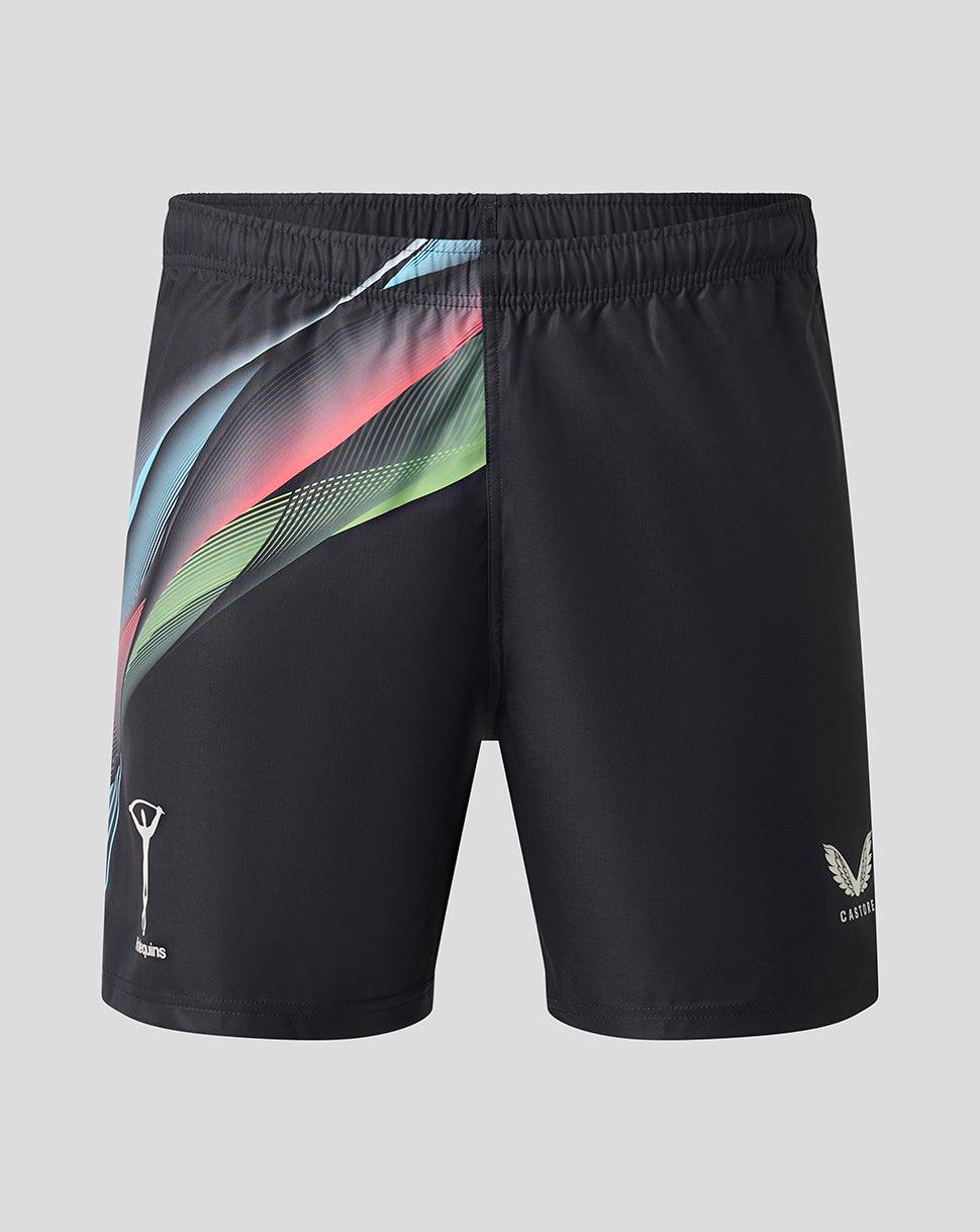 Black athletic shorts with a vibrant diagonal graphic stripe pattern in blue, green, and pink on the left side, featuring white logos on the lower left leg, shown against a solid gray background.