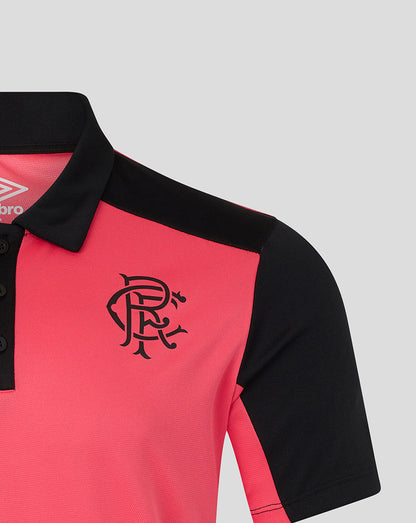 Pink and black polo shirt with a logo on a light gray background