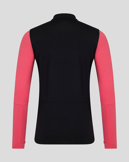 Black and pink long-sleeve shirt on a light gray background